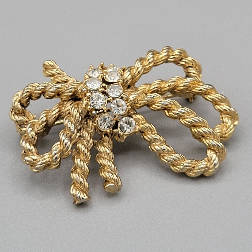 MJ Ent Gold Tone Ribbon Rope Brooch Pin White Rhinestones Signed Vintage